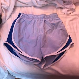 Blue Nike athletic shorts